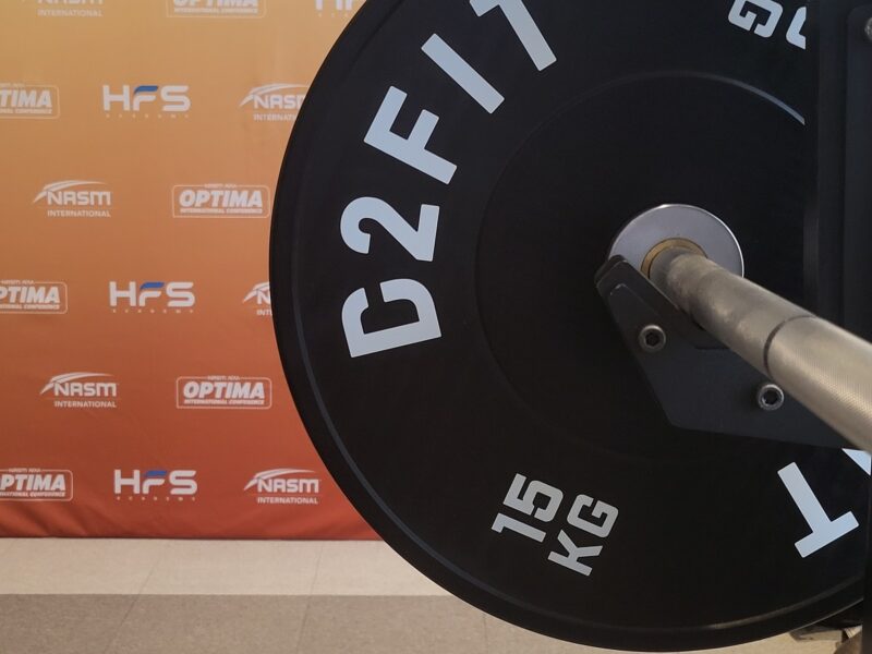 The picture shows 15kg bumper plates on the barbell for deadlifts